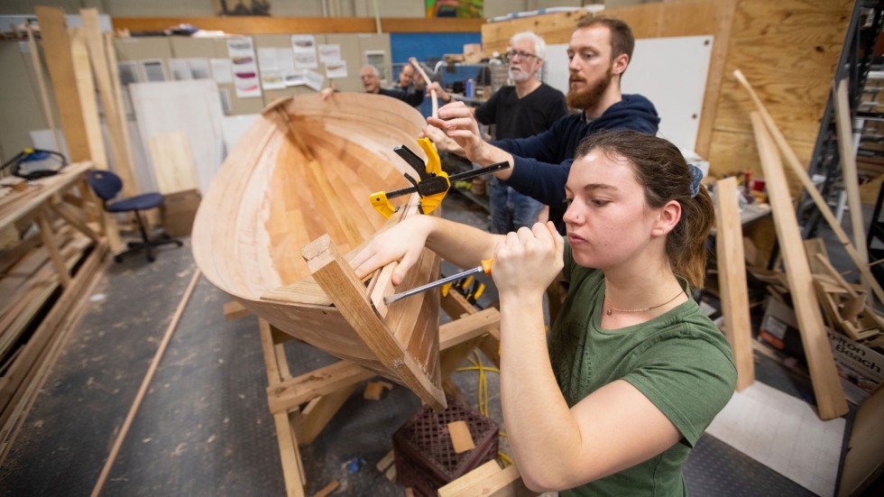 Students building a boat