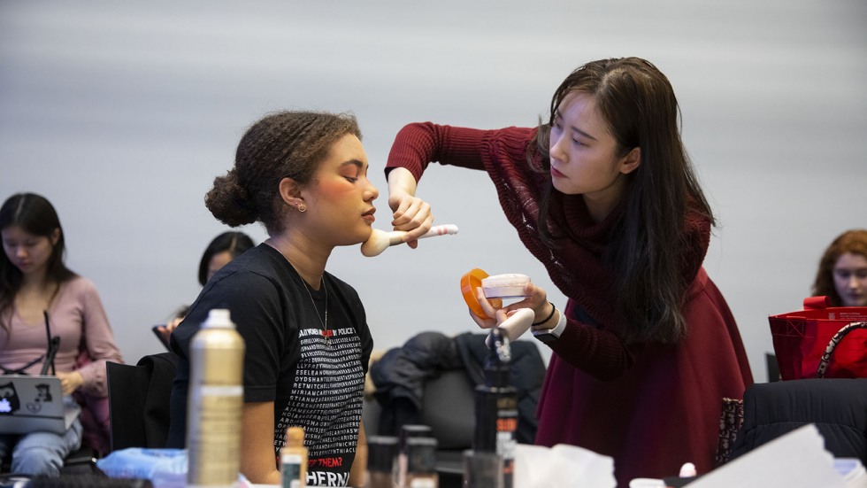 Student model having make-up applied 