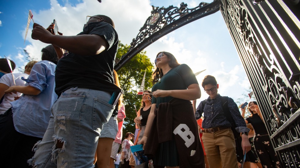 Students walking through the Van Wickle Gates 