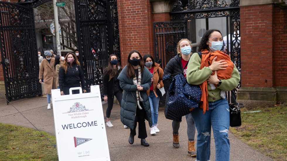 Graduate students walk through the Van Wickle Gates