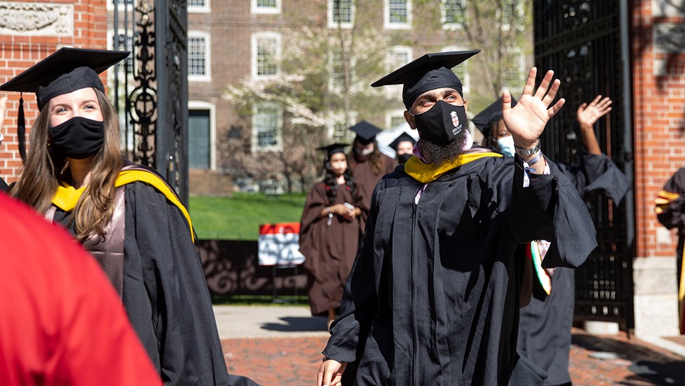 Graduates leaving through the Van Wickle Gates