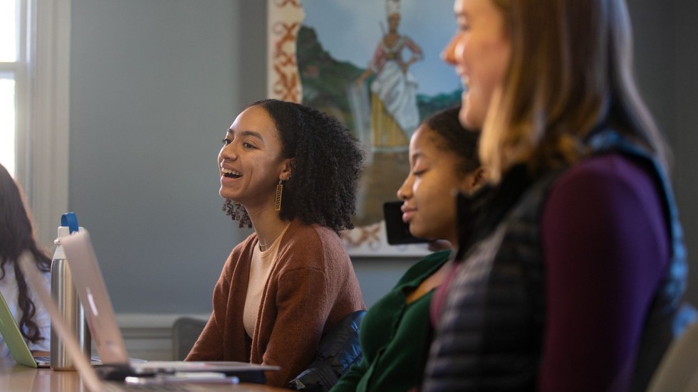 students laughing in a classroom