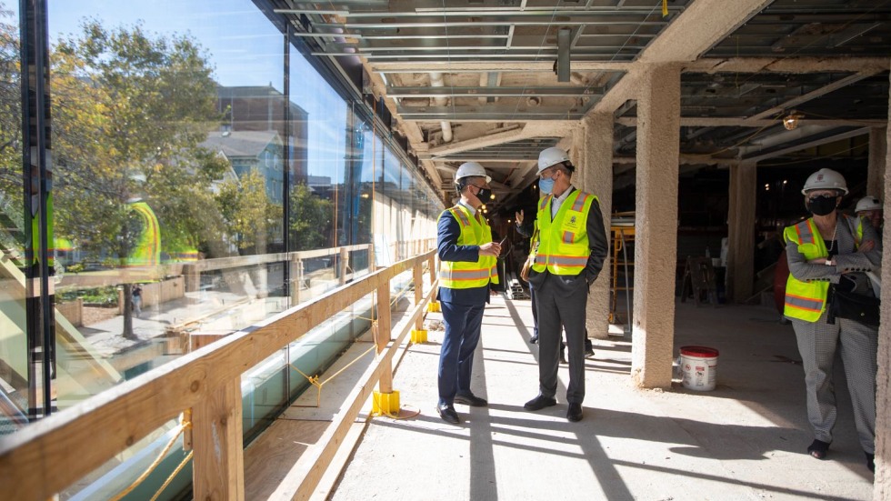 Two men talking on a construction site