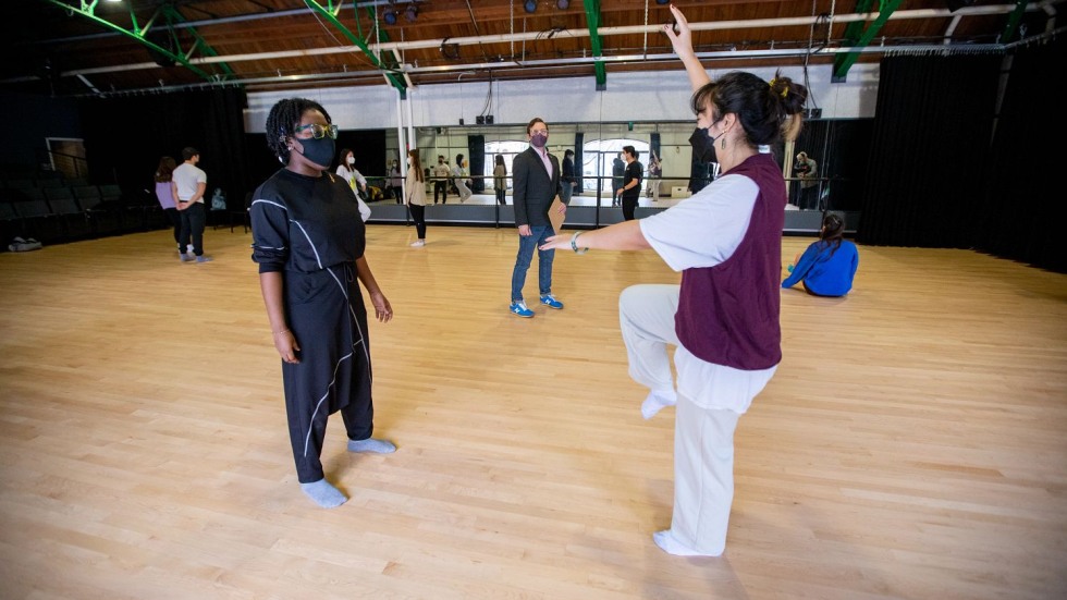 Two people dancing in a dance studio