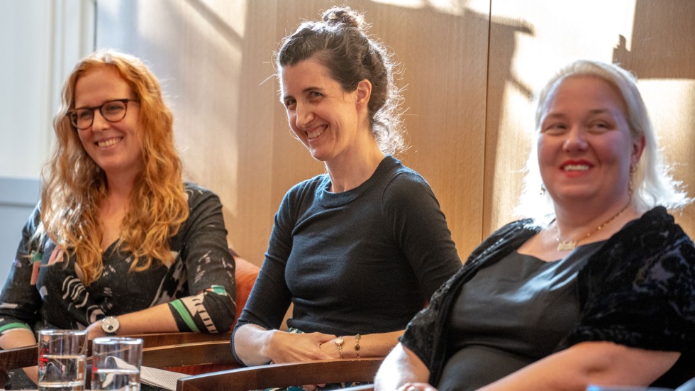 Eleanor Power, Emily Catherine Egan and Angela Murock Hussein smiling 