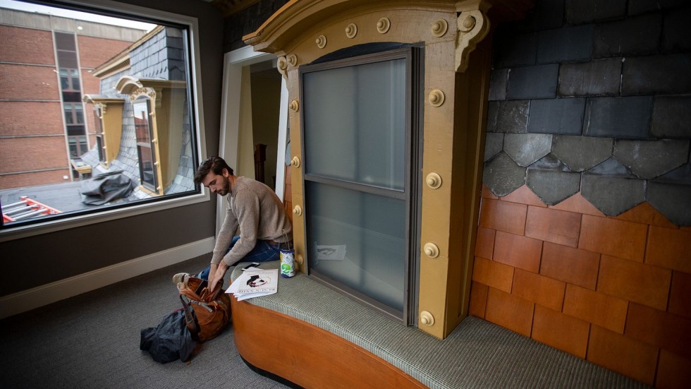 man sitting on a retrofitted window seat