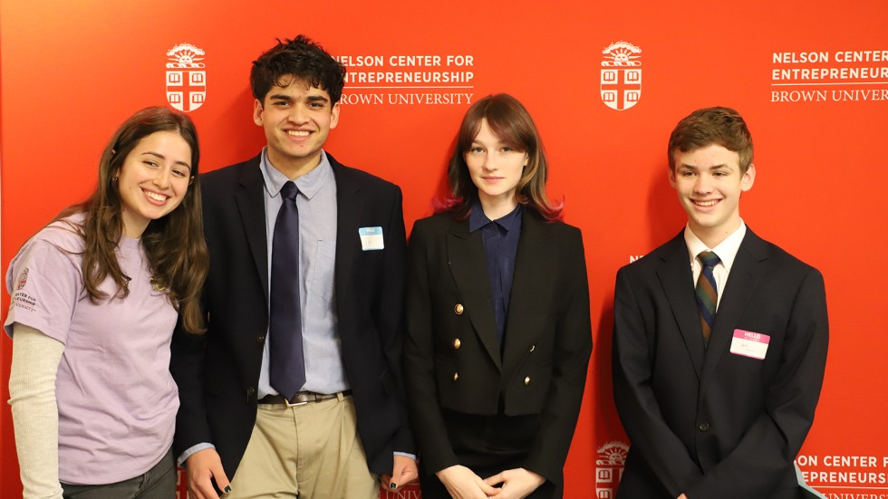 Students pose for a photo with Brown mentor 