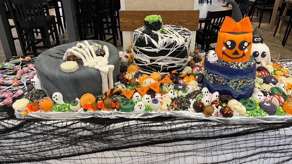 Table of baked goods decorated for Halloween