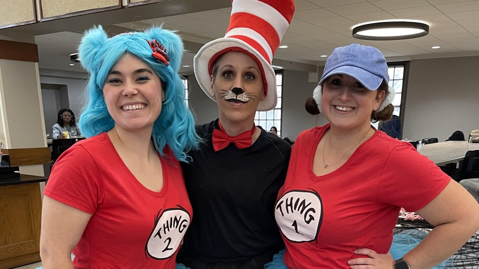 Dining Services team members dressed as the Cat In the Hat and Thing 1 and Thing 2