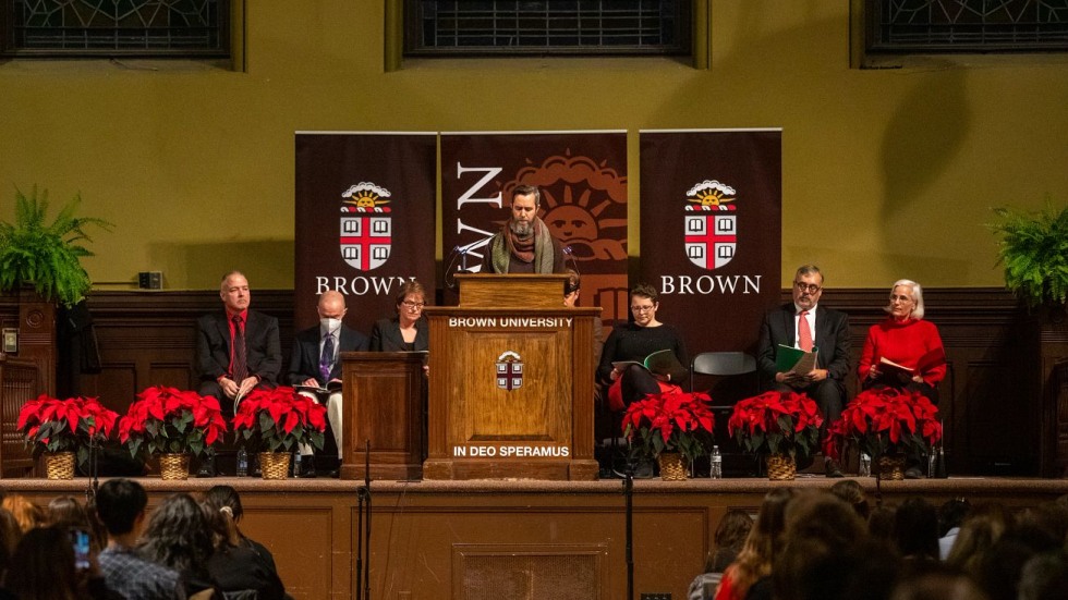 man speaking at a podium