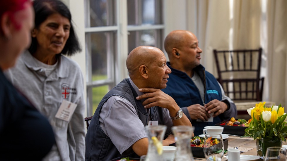 staff members enjoy lunch and conversation