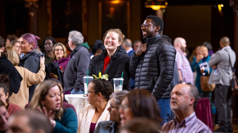 crowd members smiling