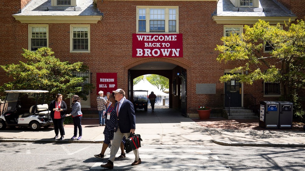 people walking in front of Wriston Quad