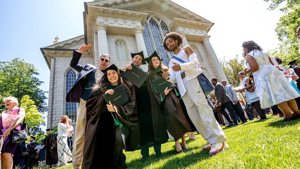Graduates celebrate outside the church
