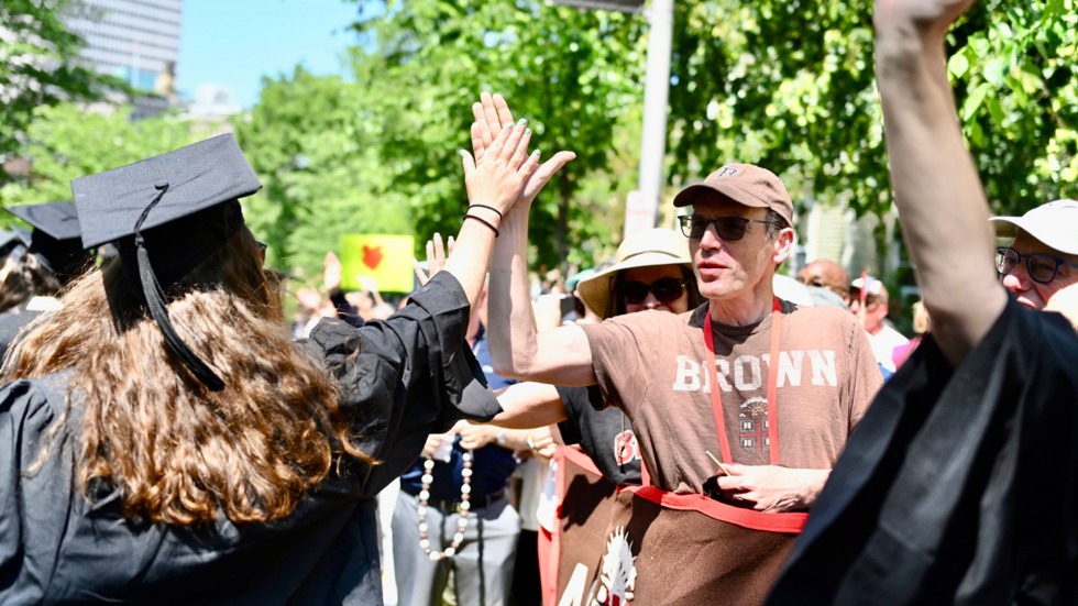 Woman high fiving man