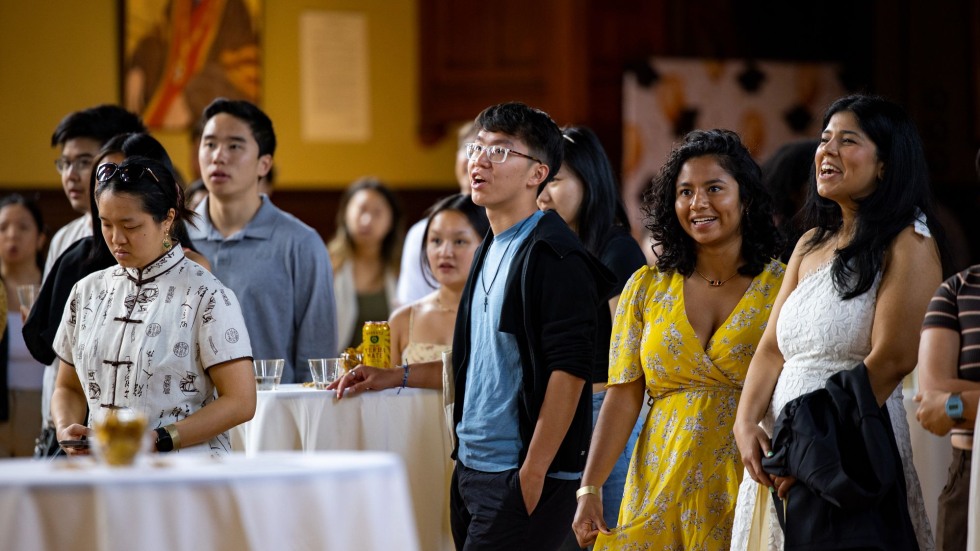 Students watch presentation in Sayles Hall