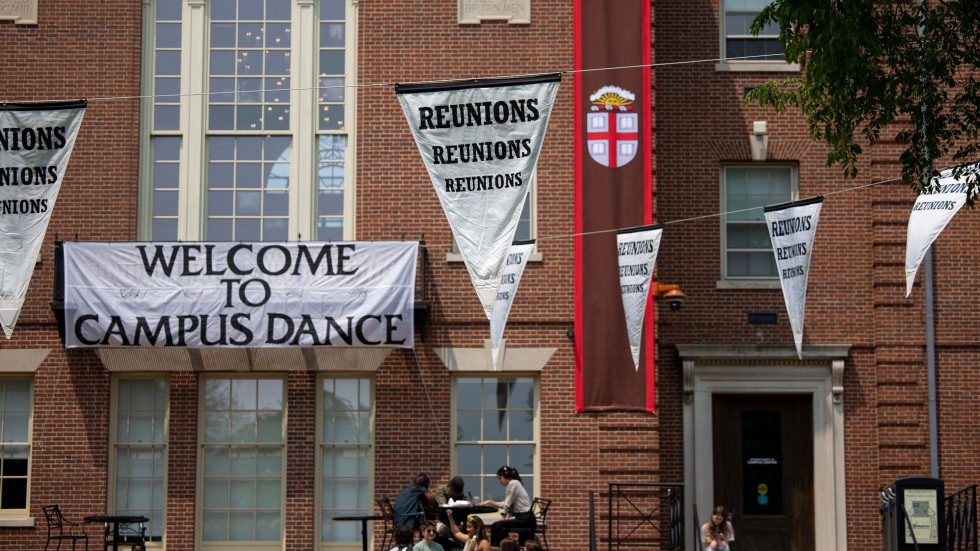 signs and banners hang on campus