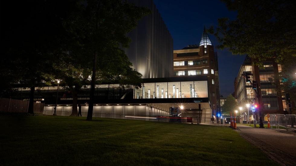 exterior of The Lindemann lobby at night, as seen from The Walk