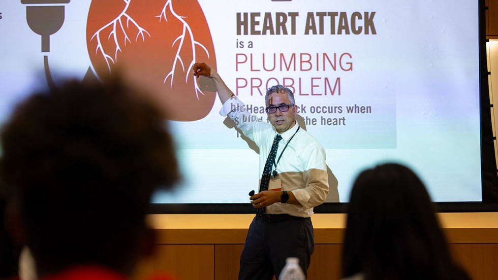Joseph Diaz teaching cardiovascular health at Week of Medicine