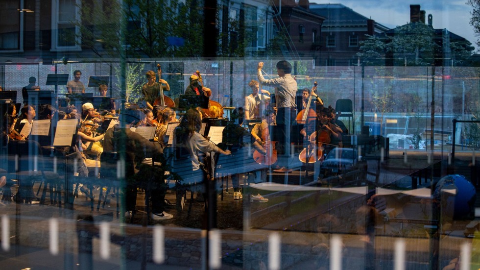 Mark Seto and the Brown University Orchestra performing in the Lindemann Performing Arts Center