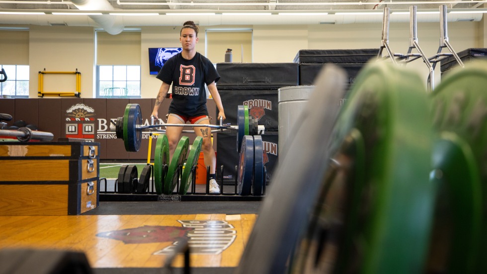 student does a deadlift