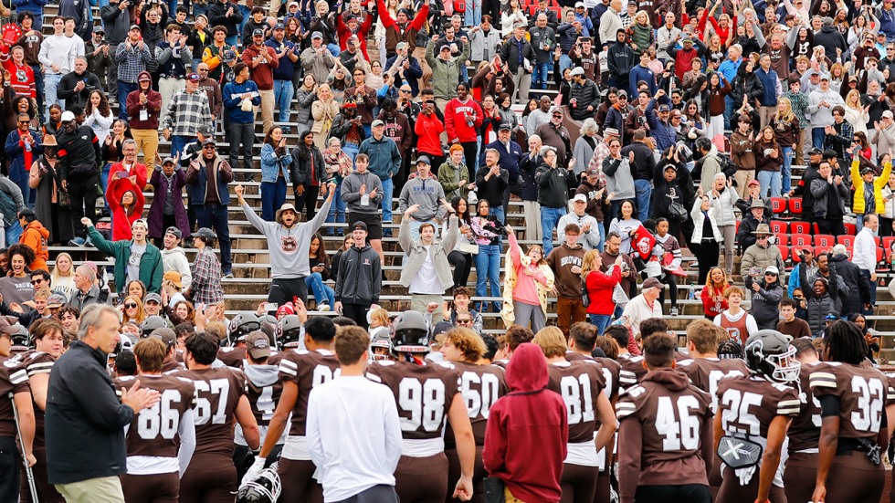 fans cheering at football game