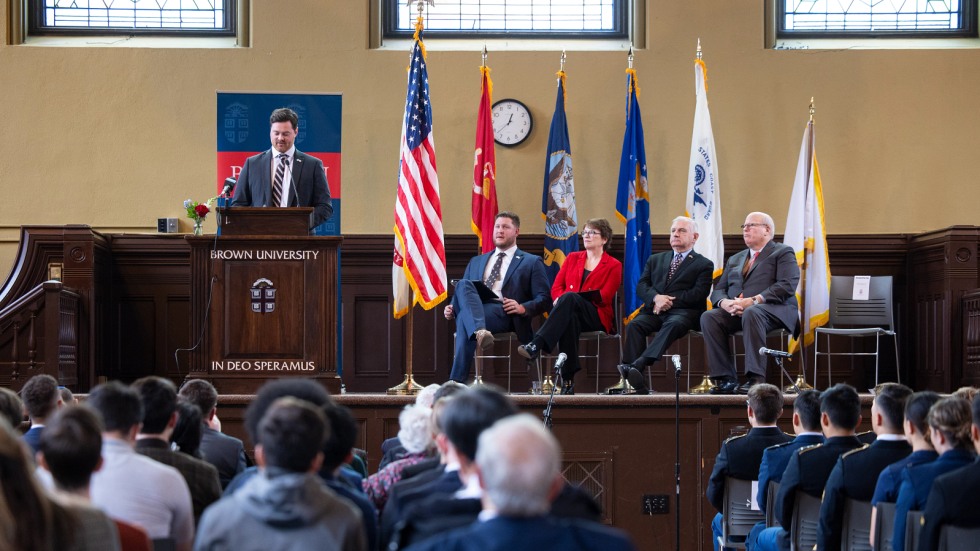 Sean Braga delivers speech at podium