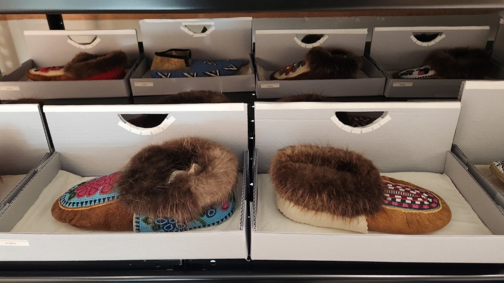 handmade moccasins arranged in drawers