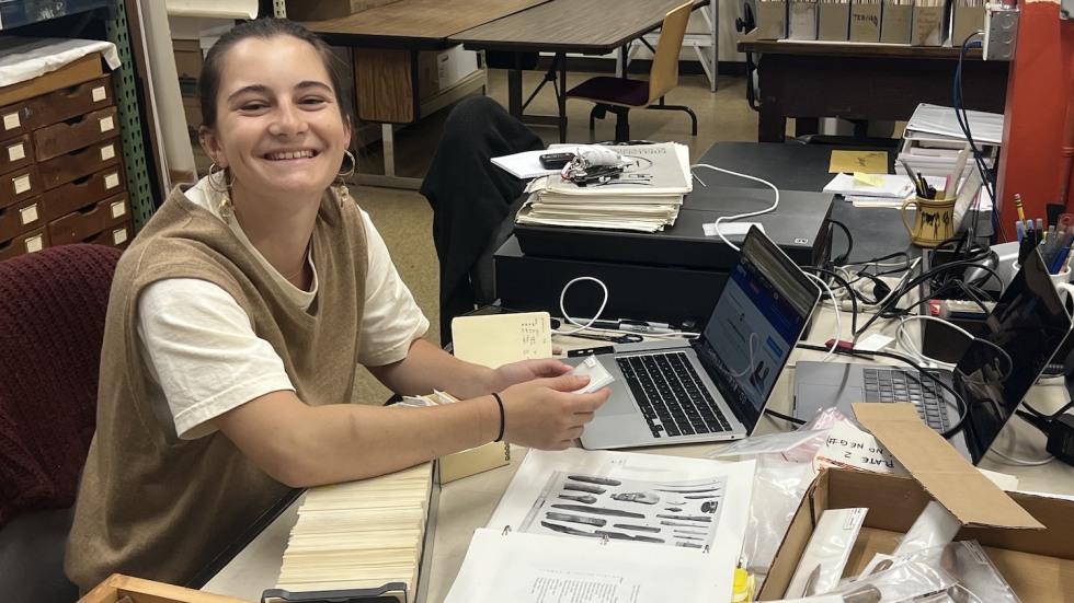 Sophie Rockwell sorting Inupiat objects 