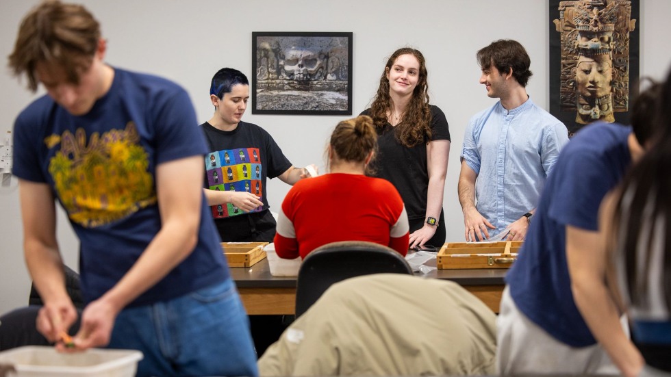 Students process finds in the lab