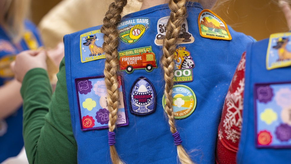 badges on Girl Scouts vests 