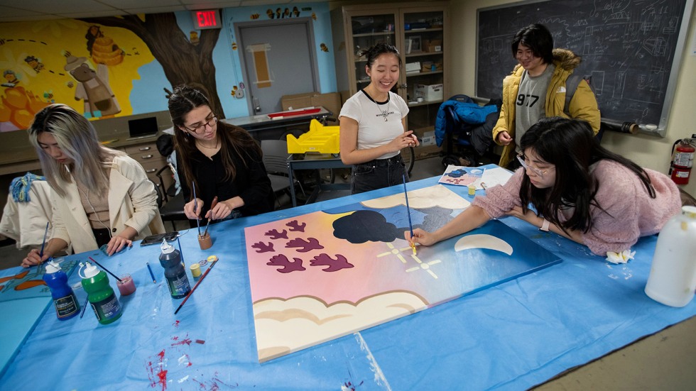 Brown students painting in Brown Design Workshop