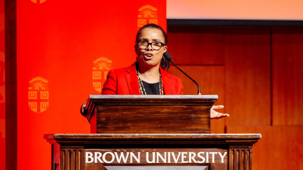 Marie Williams speaks at podium