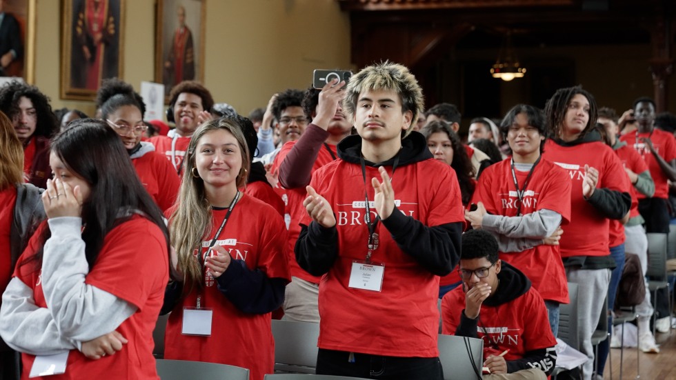 students clapping 