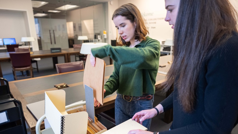 students researching in library 