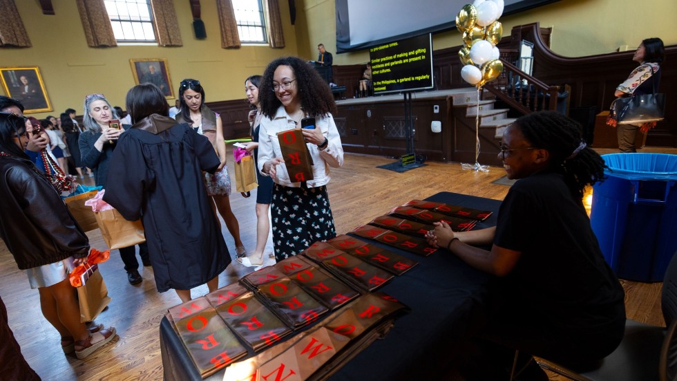 Student picks up a stole