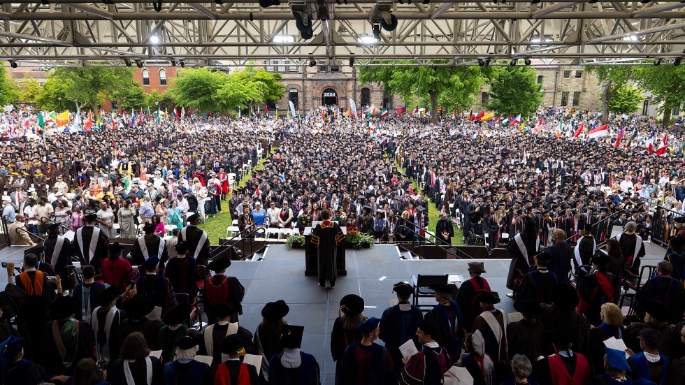 Graduates fill the College Green