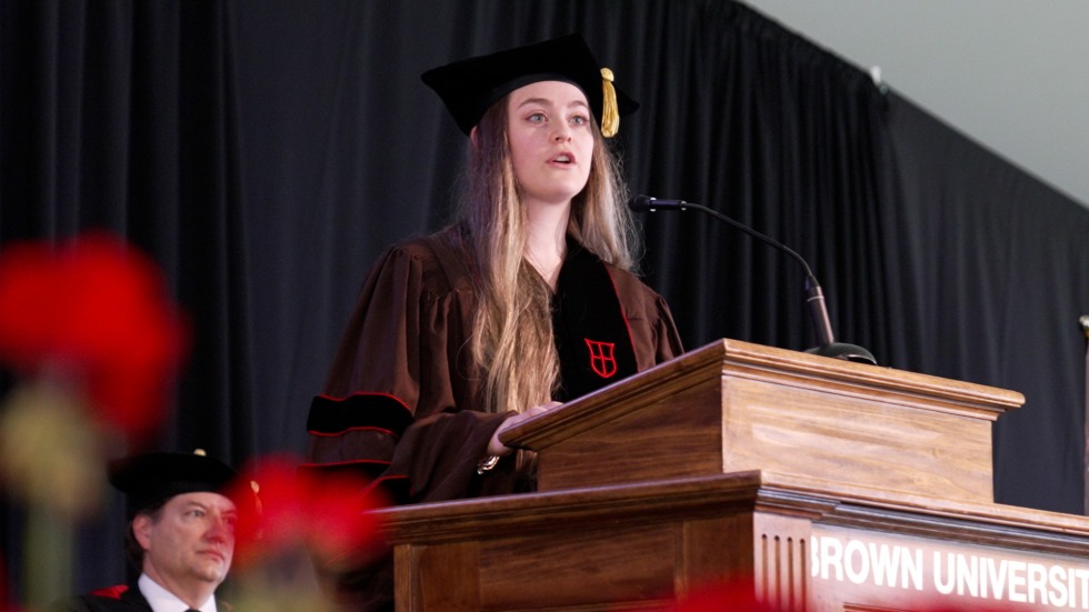 Deanna Stueber speaks at podium