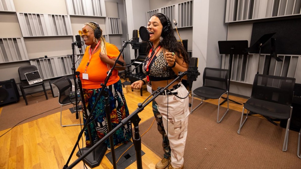 two women singing 
