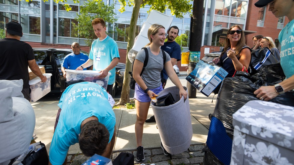 Student carrying cloth bin