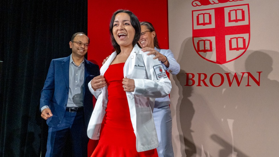 medical student receiving white coat
