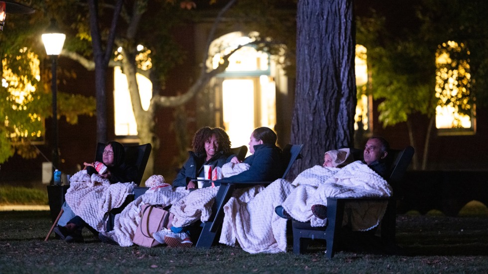 Families watch Hocus Pocus 2 on the College Green 