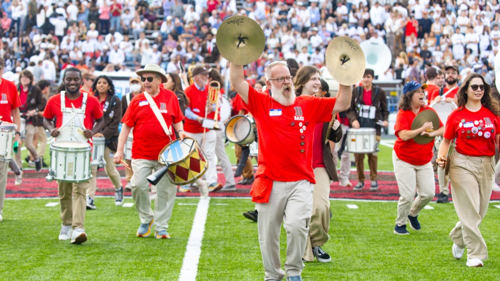 Alumni perform in a massive half-time show
