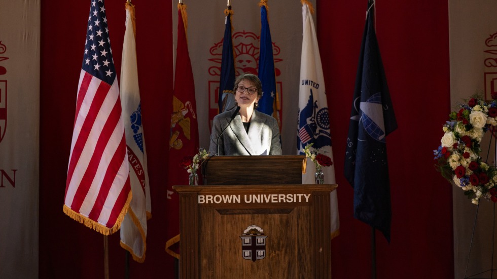 President Paxson delivers remarks at podium