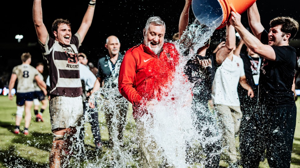 coach gets water thrown on him after win 