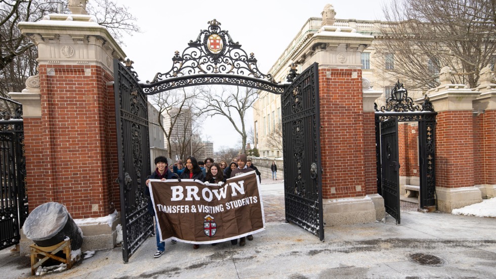 midyear transfer students proceed through Van Wickle Gates