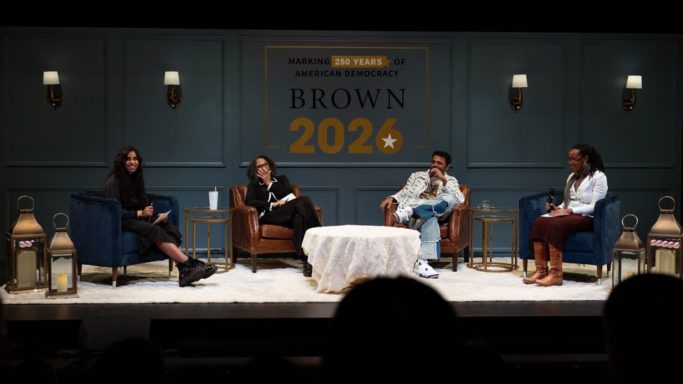 Daveed Diggs on stage with Brown students