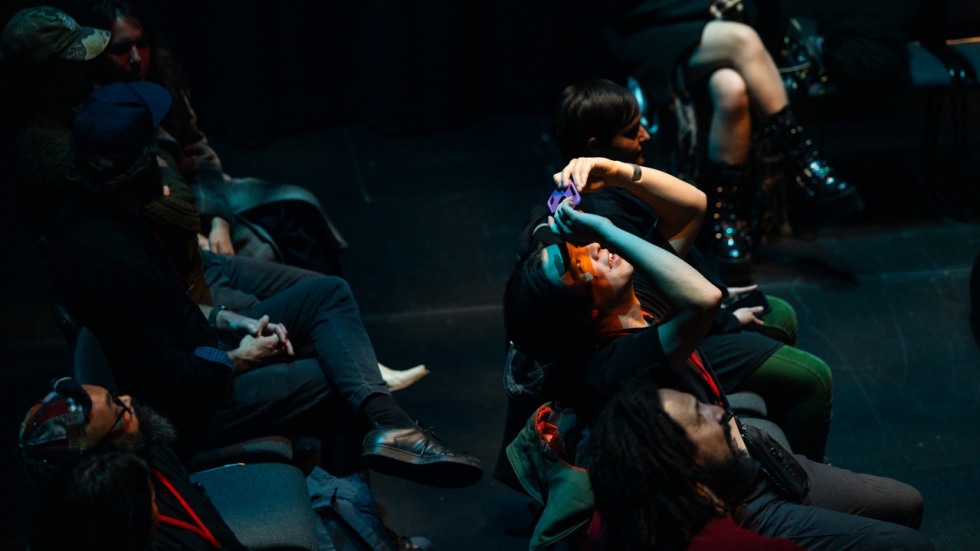 audience members gaze upward