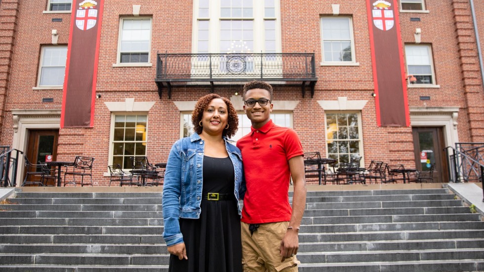Alejandro Jackson stands with his mom in 2021