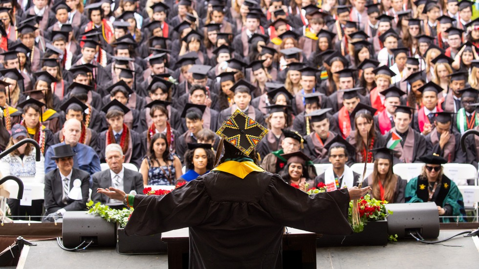 Nkéke Harris speaks at the podium